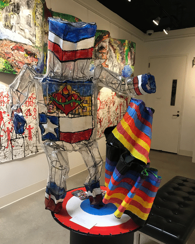 sculpture with Texas flag and sacred heart design